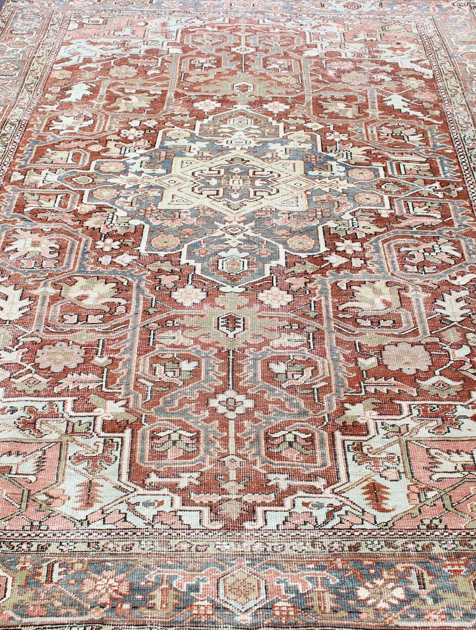 Persian Antique Heriz in Soft Red, Gray Blue, Pale Green & Geometric Design. Measures: 7'6 x 10'8 Gray blue, soft green, soft red Persian Heriz with geometric medallion design,rug M14 - 0513, country of origin / type: Iran / Heriz, circa ... - Keivan Woven ArtsM14 - 0513 - 5393Rug