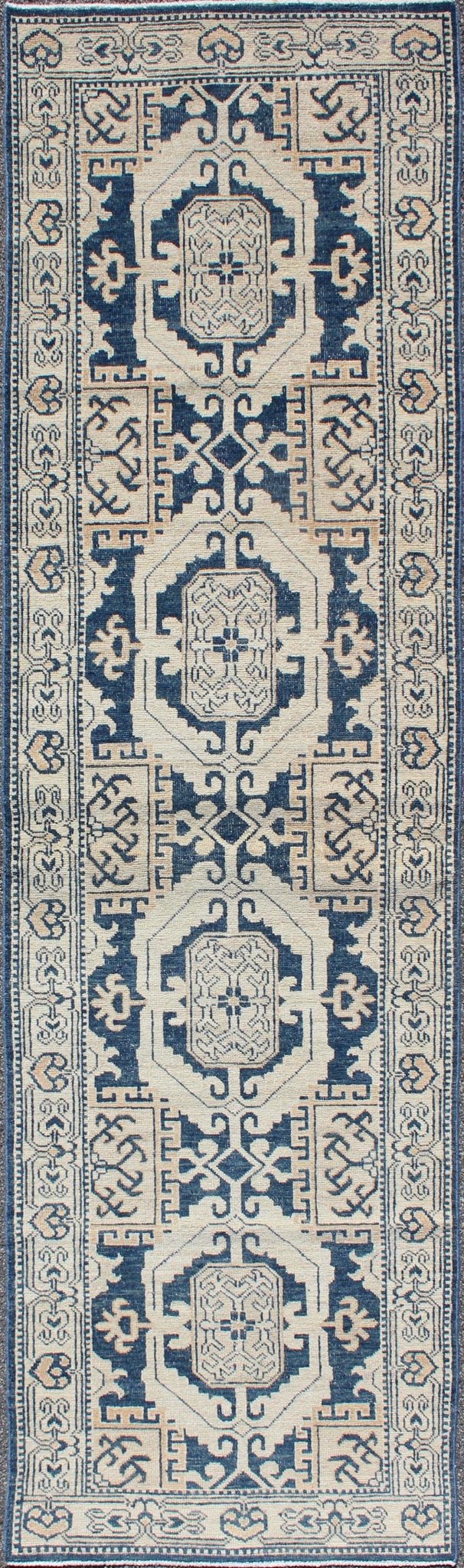 Vintage Khotan Rug with Geometric Medallions in Navy and Cream Tones Khotan with Geometric Medallions, rug MP - 1310 - 93, country of origin / type: Afghanistan / Khotan, circa Early - 21st Century. Measures: 2'11 x 10'3. This Khotan fe... - Keivan Woven ArtsMP - 1310 - 93 - 4758Rug