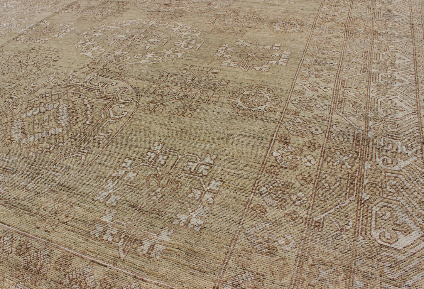 Khotan Design Rug with All - Over Geometric Pattern in Light Brown and Green's. Keivan Woven Arts / rug MP - 1409 - 1446 country of origin / type: Afghanistan / Khotan. Measures: 8'6 x 10'4 This Khotan features a geometric all - over design flanked by a ... - Keivan Woven ArtsMP - 1409 - 1446 - 5924