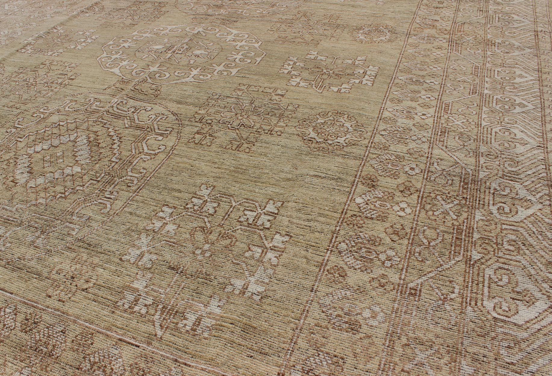 Khotan Design Rug with All - Over Geometric Pattern in Light Brown and Green's. Keivan Woven Arts / rug MP - 1409 - 1446 country of origin / type: Afghanistan / Khotan. Measures: 8'6 x 10'4 This Khotan features a geometric all - over design flanked by a ... - Keivan Woven ArtsMP - 1409 - 1446 - 5924