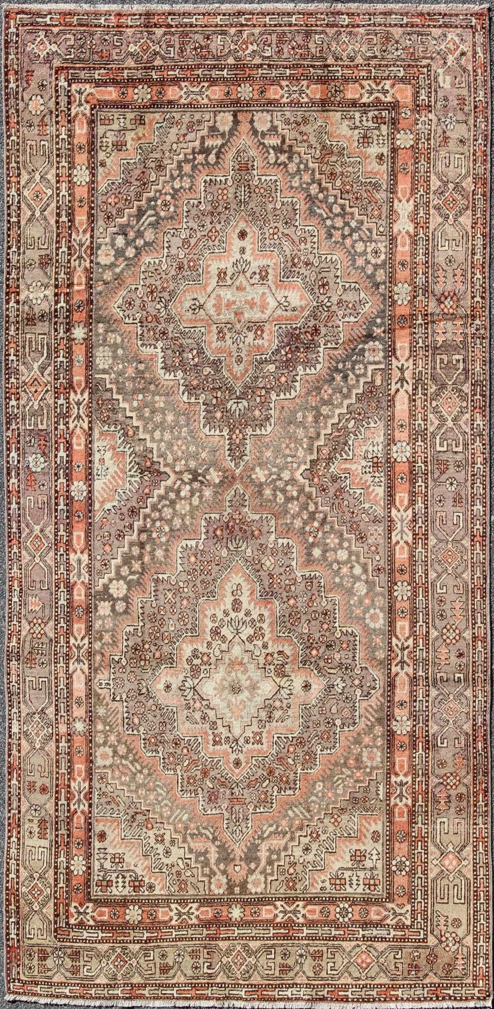 Khotan Gallery Rug This beautiful Khotan rug from East Turkestan has a wonderful, light purple border that imbues it with an Asian aesthetic. The border is encased by two guard borders, featuring a multicolored Greek key design. The field has tw... - Keivan Woven ArtsMP - 1610 - 157264 - 7865Rug