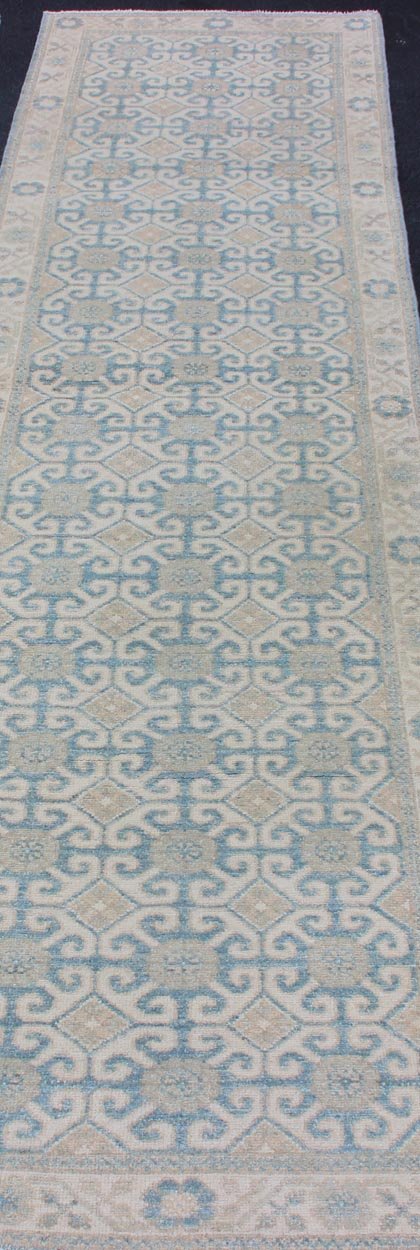 Rug with All - over Khotan Design with Geometric Motifs MP - 1911 - 10702, country of origin / type: Afghanistan / Khotan This Reproduction Khotan features a geometric all - over design flanked by a repeating pattern in the border. The entirety of the p... - Keivan Woven ArtsMP - 1911 - 10702 - 12557Rug