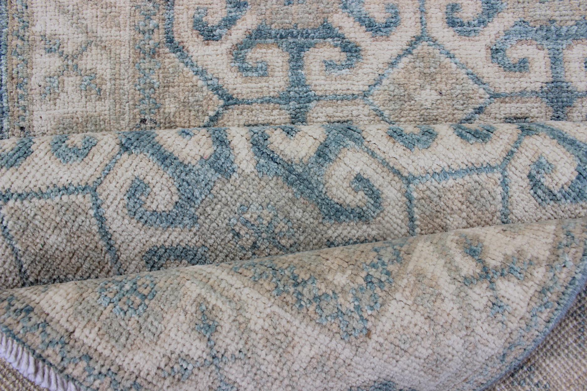 Rug with All - over Khotan Design with Geometric Motifs MP - 1911 - 10702, country of origin / type: Afghanistan / Khotan This Reproduction Khotan features a geometric all - over design flanked by a repeating pattern in the border. The entirety of the p... - Keivan Woven ArtsMP - 1911 - 10702 - 12557Rug