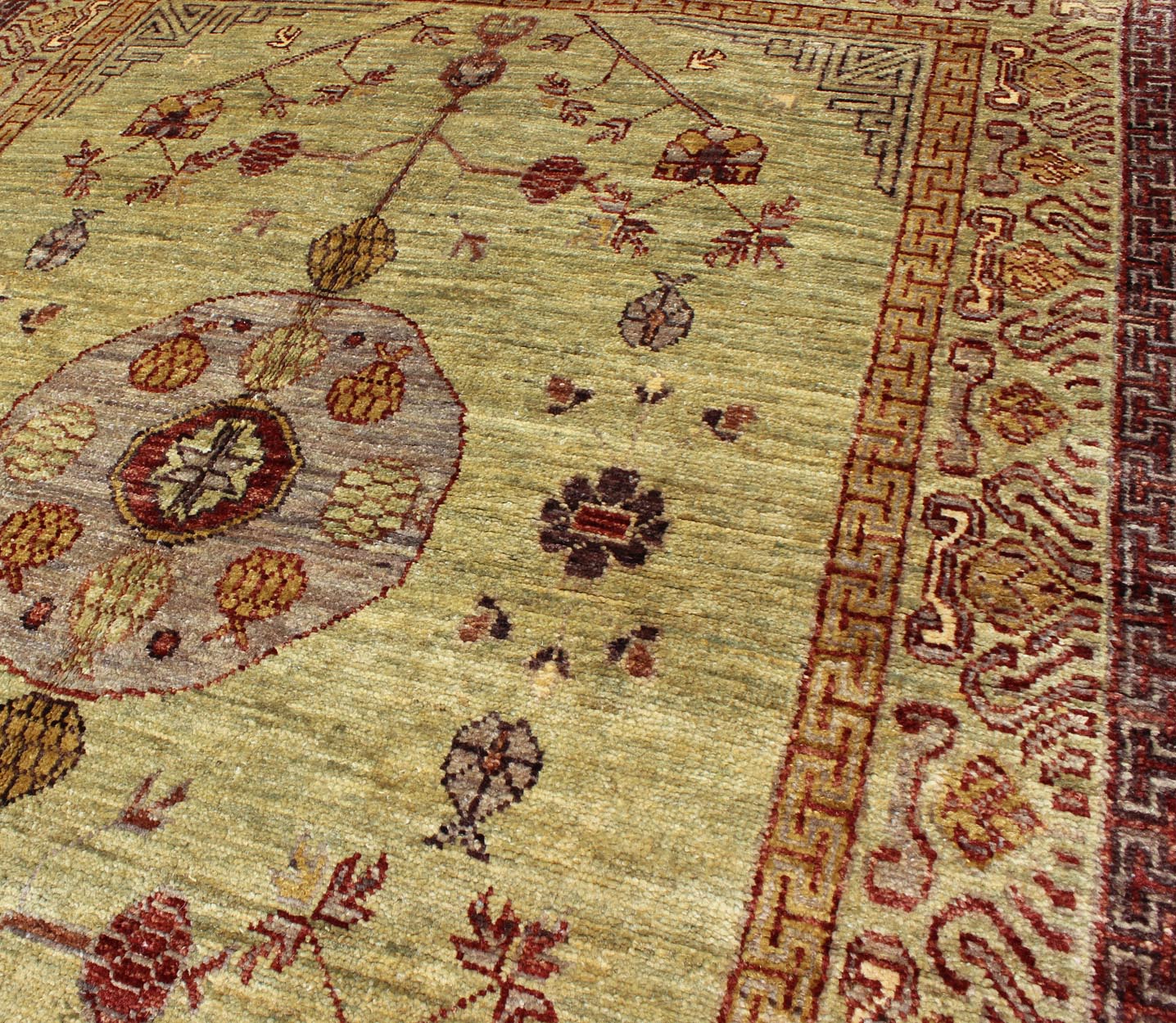 Vintage Khotan Design Rug with Circular Medallion on Light Pistachio Green, rug MP - 864, country of origin / type: Afghanistan / Khotan This Khotan features a circular medallion flanked by Greek key and repeating pattern in the border. The entire... - Keivan Woven ArtsMP - 864 - 2380Rug