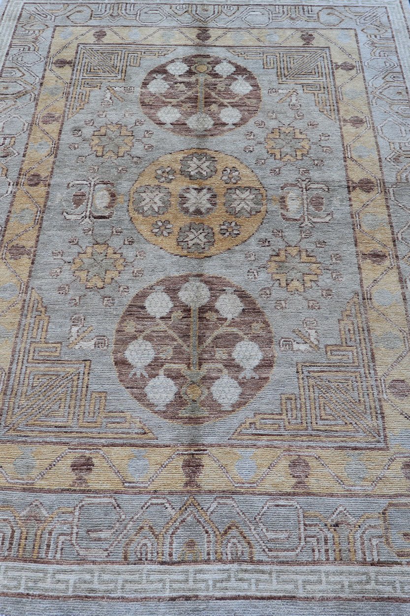 Vintage Khotan Design Rug with Three Medallion Pattern in Light Blue - Green Light Khotan rug with Circular Medallions in Light Blues - Green, Brown, Yellow and cream , rug MP - 865, country of origin / type: Afghanistan / Khotan This Khotan feat... - Keivan Woven ArtsMP - 865 - 2384Rug