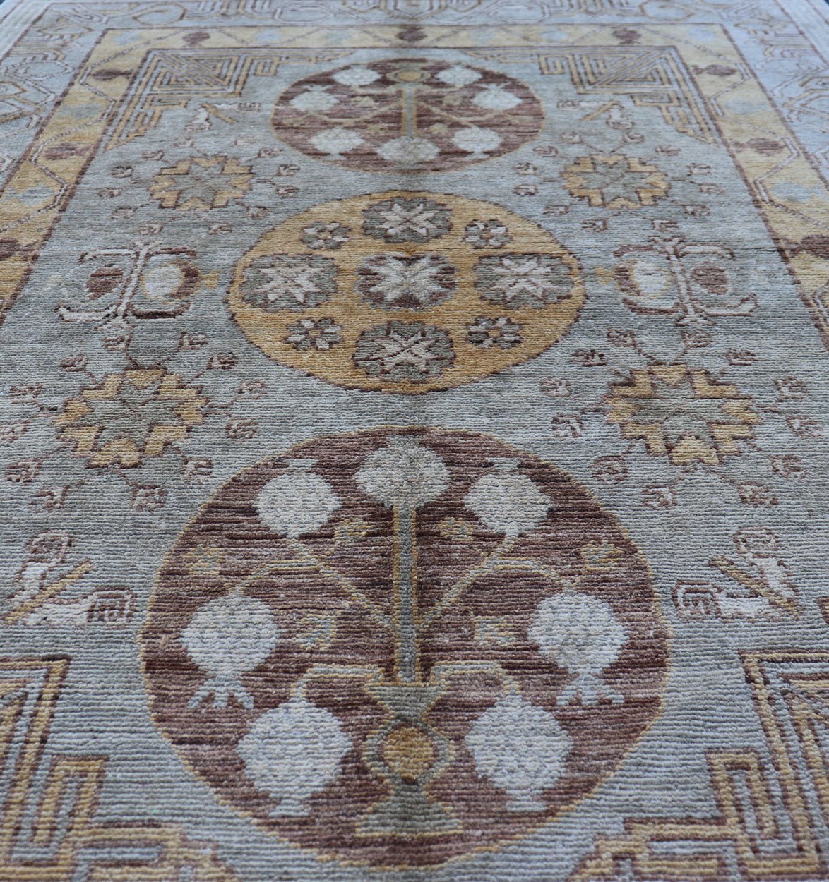 Vintage Khotan Design Rug with Three Medallion Pattern in Light Blue - Green Light Khotan rug with Circular Medallions in Light Blues - Green, Brown, Yellow and cream , rug MP - 865, country of origin / type: Afghanistan / Khotan This Khotan feat... - Keivan Woven ArtsMP - 865 - 2384Rug