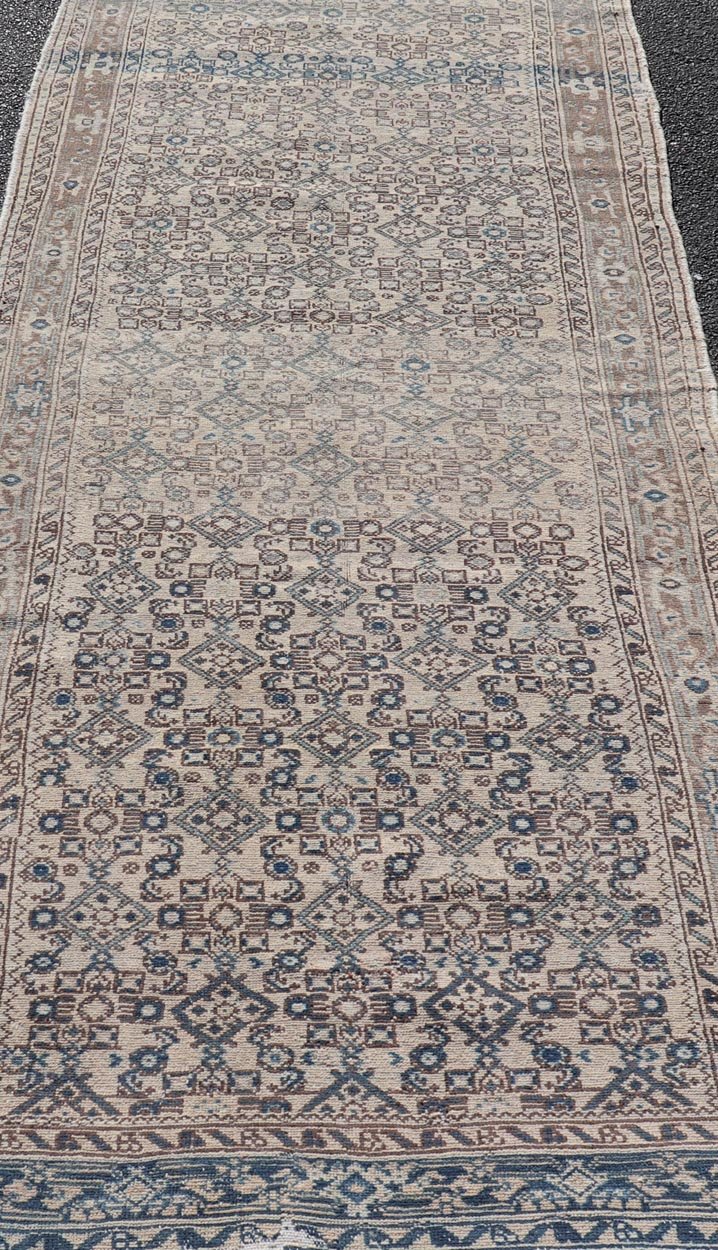 Vintage Persian Hamadan Runner in Cool Tones of Light Blue, Ivory, and L. Brown. Country of Origin: Iran; Type: Hamedan; Design: Floral, Persian Floral, All - Over; Keivan Woven Arts: rug MSE - 1944. Measures: 3'7 x 9'8 This vintage Persian runner f... - Keivan Woven ArtsMSE - 1944 - 25581Rug