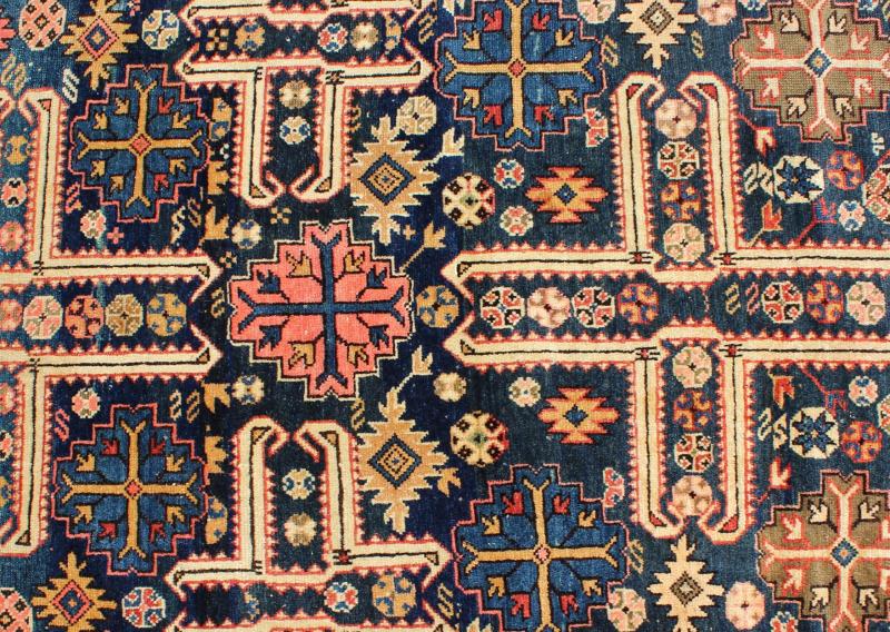 Antique Caucasian Karaghashli Rug The archetypal motifs in this piece are accompanied by a tower of stacked polygons with small V - shaped indentations, a Karaghashli rug hallmark. Each decorative foil is embellished with eight - armed brackets and ... - Keivan Woven ArtsN15 - 0101 - 80Rug
