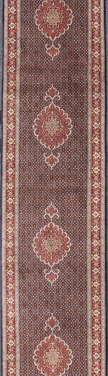 N15 - 0701, Vintage Persian Tabriz Runner - This Semi Antique Tabriz runner is hand - woven of wool and silk features a repeating medallion design rendered in red and brown tones. 2'7 X 12' - Keivan Woven ArtsN15 - 0701 - 6588Rug