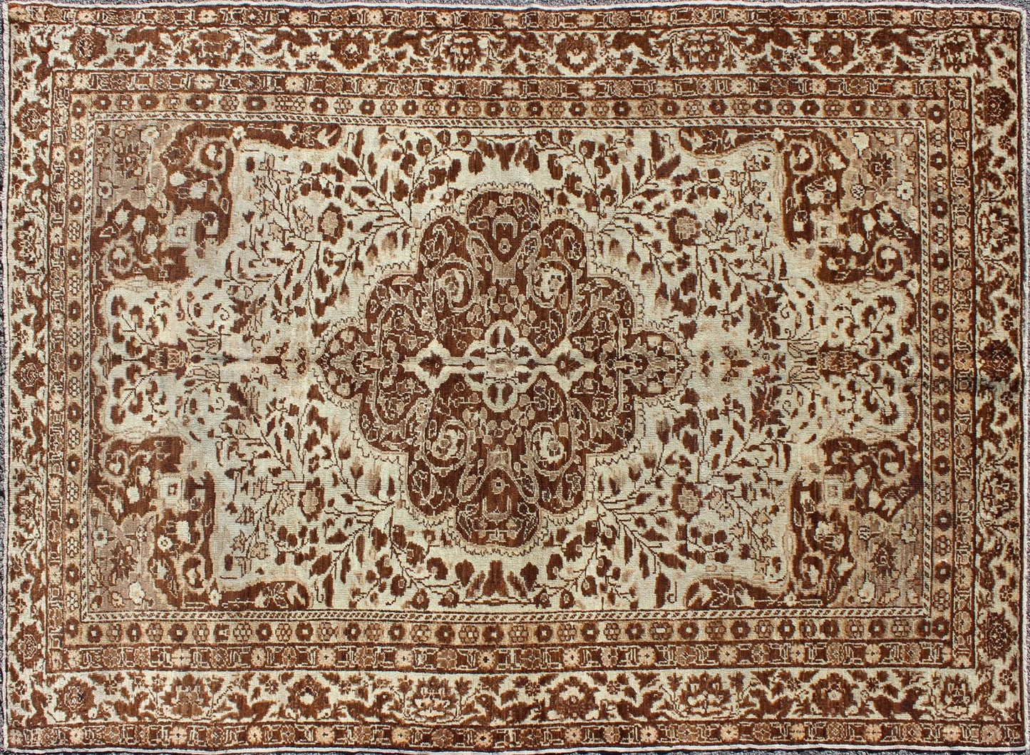 Measures: 5'1 x 7'3 This century - old Sivas displays an ivory field surrounded by a richly detailed classical arabesque design, with an intricate center medallion in the field that animates the tone and plays off of the finely detailed texture ... - Keivan Woven ArtsNA - 63818 - 1036Rug