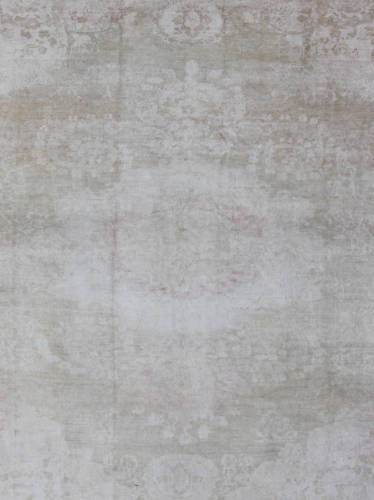 Antique Turkish Konya Area Rug in Gray & Soft Pink with Subtle Design Measures: 7.3 x 8.8 This intricate antique Turkish Konya carpet features a muted color palette of taupe, light gray, and ash pink, with a beautiful botanical central m... - Keivan Woven ArtsNA - 75054 - 794Rug