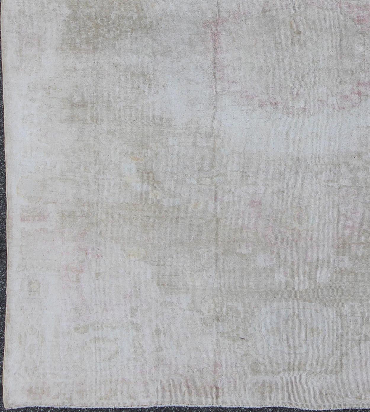 Antique Turkish Konya Area Rug in Gray & Soft Pink with Subtle Design Measures: 7.3 x 8.8 This intricate antique Turkish Konya carpet features a muted color palette of taupe, light gray, and ash pink, with a beautiful botanical central m... - Keivan Woven ArtsNA - 75054 - 794Rug
