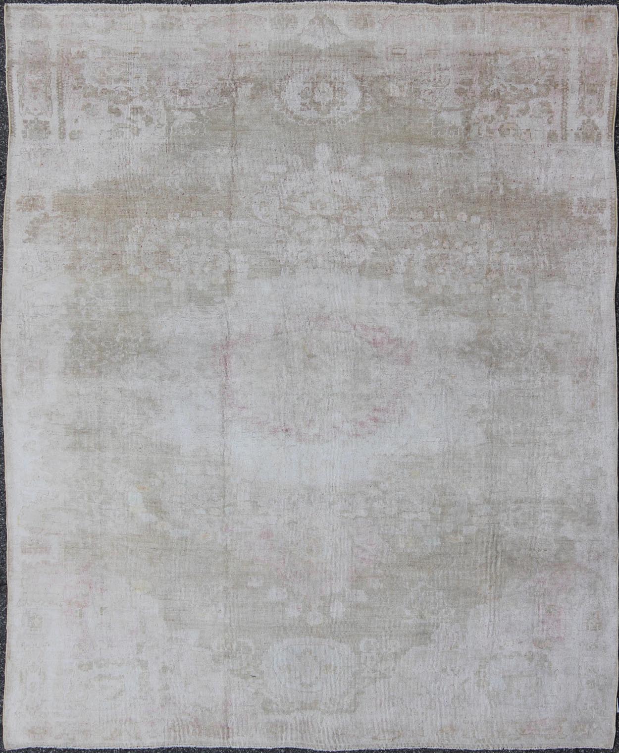 Antique Turkish Konya Area Rug in Gray & Soft Pink with Subtle Design Measures: 7.3 x 8.8 This intricate antique Turkish Konya carpet features a muted color palette of taupe, light gray, and ash pink, with a beautiful botanical central m... - Keivan Woven ArtsNA - 75054 - 794Rug