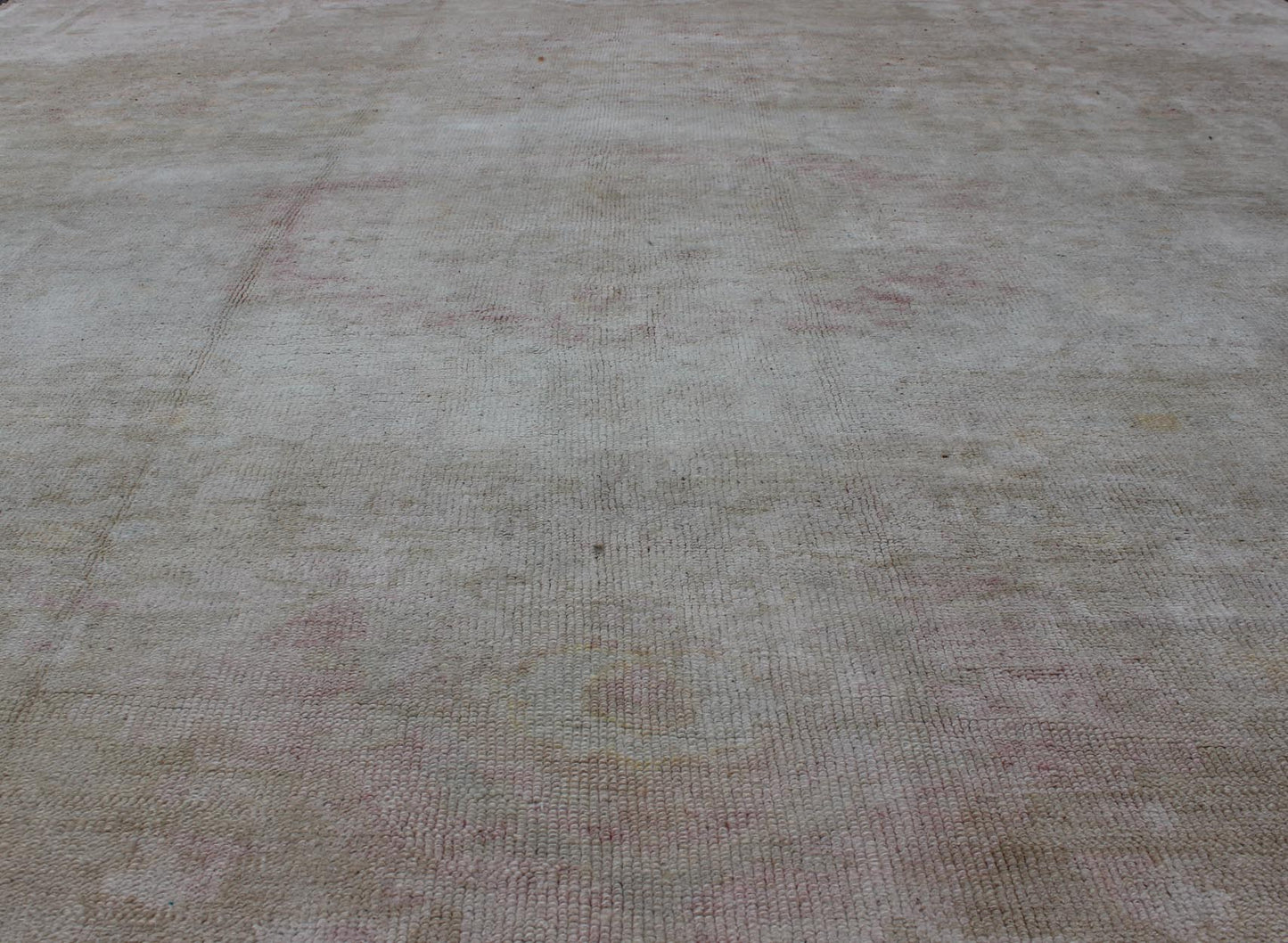 Antique Turkish Konya Area Rug in Gray & Soft Pink with Subtle Design Measures: 7.3 x 8.8 This intricate antique Turkish Konya carpet features a muted color palette of taupe, light gray, and ash pink, with a beautiful botanical central m... - Keivan Woven ArtsNA - 75054 - 794Rug