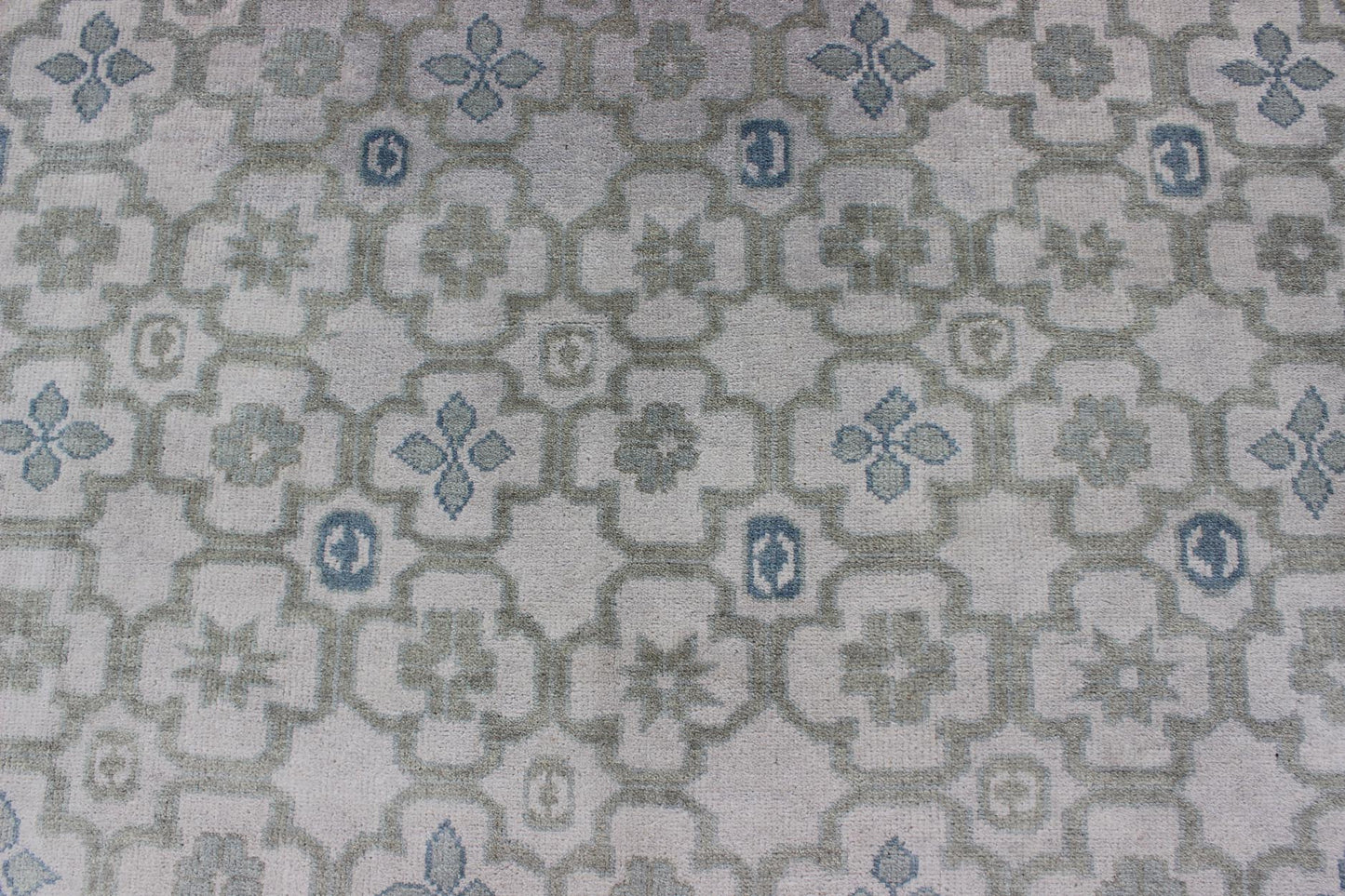 Modern Hand - Knotted Khotan Rug in Wool with All - Over Sub - Geometric Design by Keivan Woven Arts This modern Khotan rug has been hand - knotted in wool and features an all - over sub - geometric design rendered in blue, green and cream tones. A complem... - Keivan Woven ArtsOB - 103140415 - 1100057 - 9693Rug