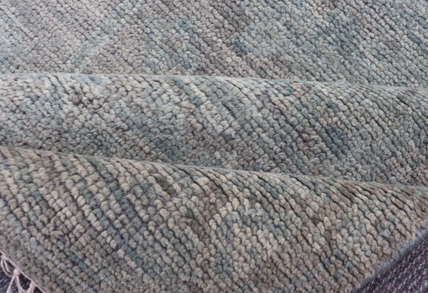 Modern Muted Oushak Type Rug in Wool With Sub - Geometric Design in Green & Earthy Tones This modern Indian rug has been hand - knotted in wool and features an all - over, sub - geometric design rendered in green and earthy tones. A complementary, mult... - Keivan Woven ArtsOB - 104744922 - 56230141 - 15512