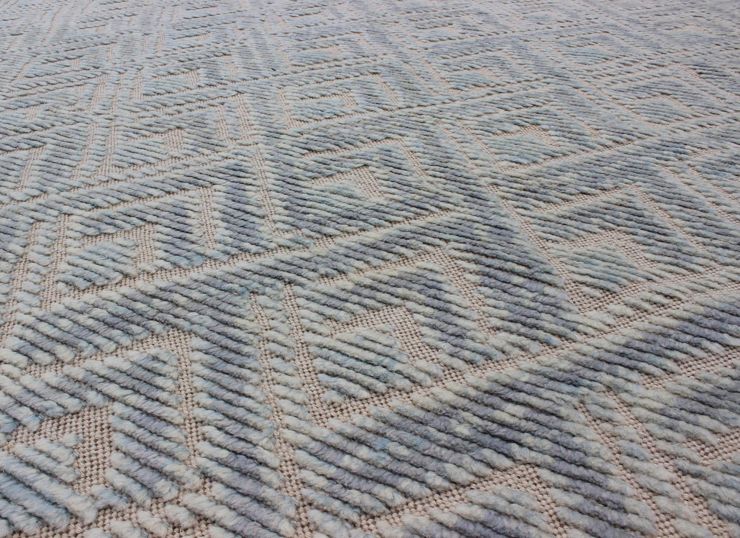 Keivan Woven Arts Hi - Low pile in Moroccan Design with Light Blue. Measures: 8' x 10' This Keivan Woven Arts rug/OB - 9288120 - 521003 is a hand - knotted Hi - Low Moroccan design rug features a modern design rendered in shades of blue. - Keivan Woven ArtsOB - 9288120 - 521003 - 8511Rug