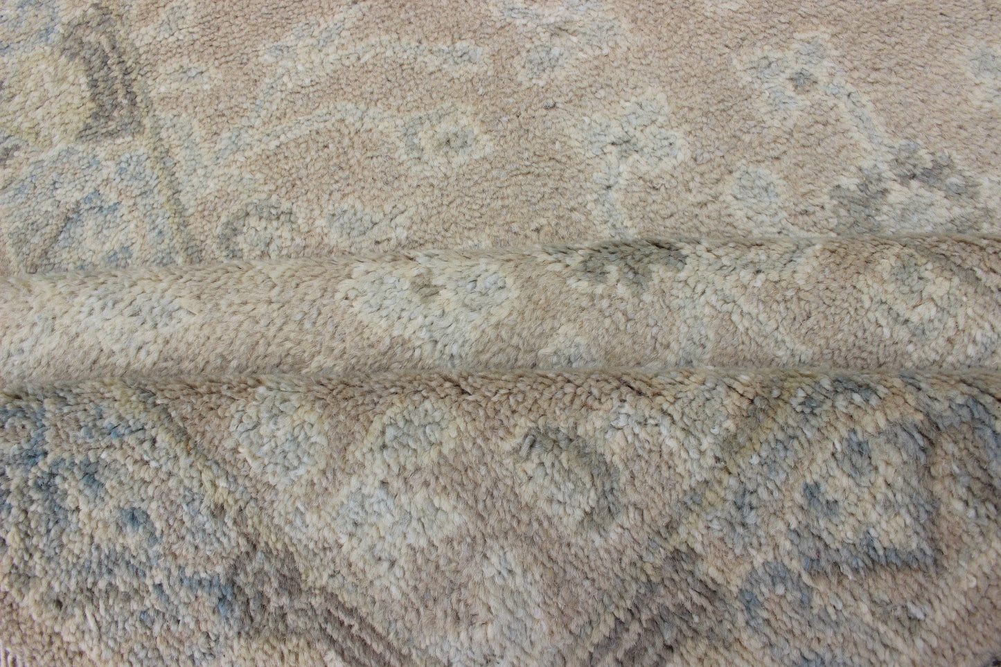 Modern Khotan Runner in Wool with All - Over Sub - Geometric Floral Design This modern Indian Khotan rug has been hand - knotted in wool and features an all - over, sub - geometric floral design rendered in blue and neutral tones. A complementary border e... - Keivan Woven ArtsOB - 9289470 - 6270004 - 11332Rug