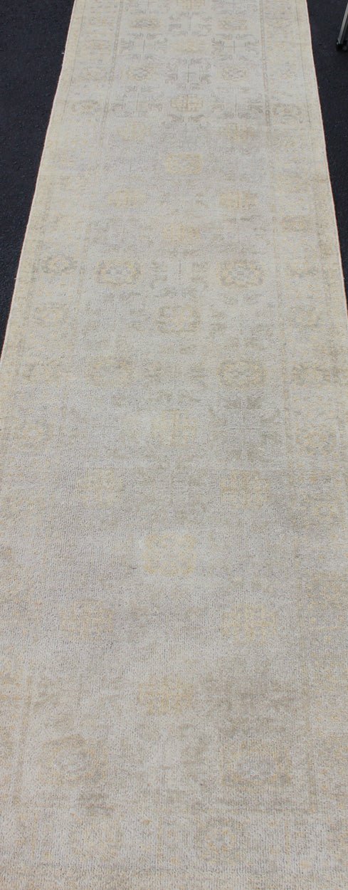 Keivan Woven arts Modern Hand - Knotted Khotan Runner in Wool with Sub - Geometric Design This modern Indian Khotan rug has been hand - knotted in wool and features an all - over, sub - geometric design rendered in marigold and neutral tones. A compleme... - Keivan Woven ArtsOB - 9365807 - 5920078 - 11293Rug