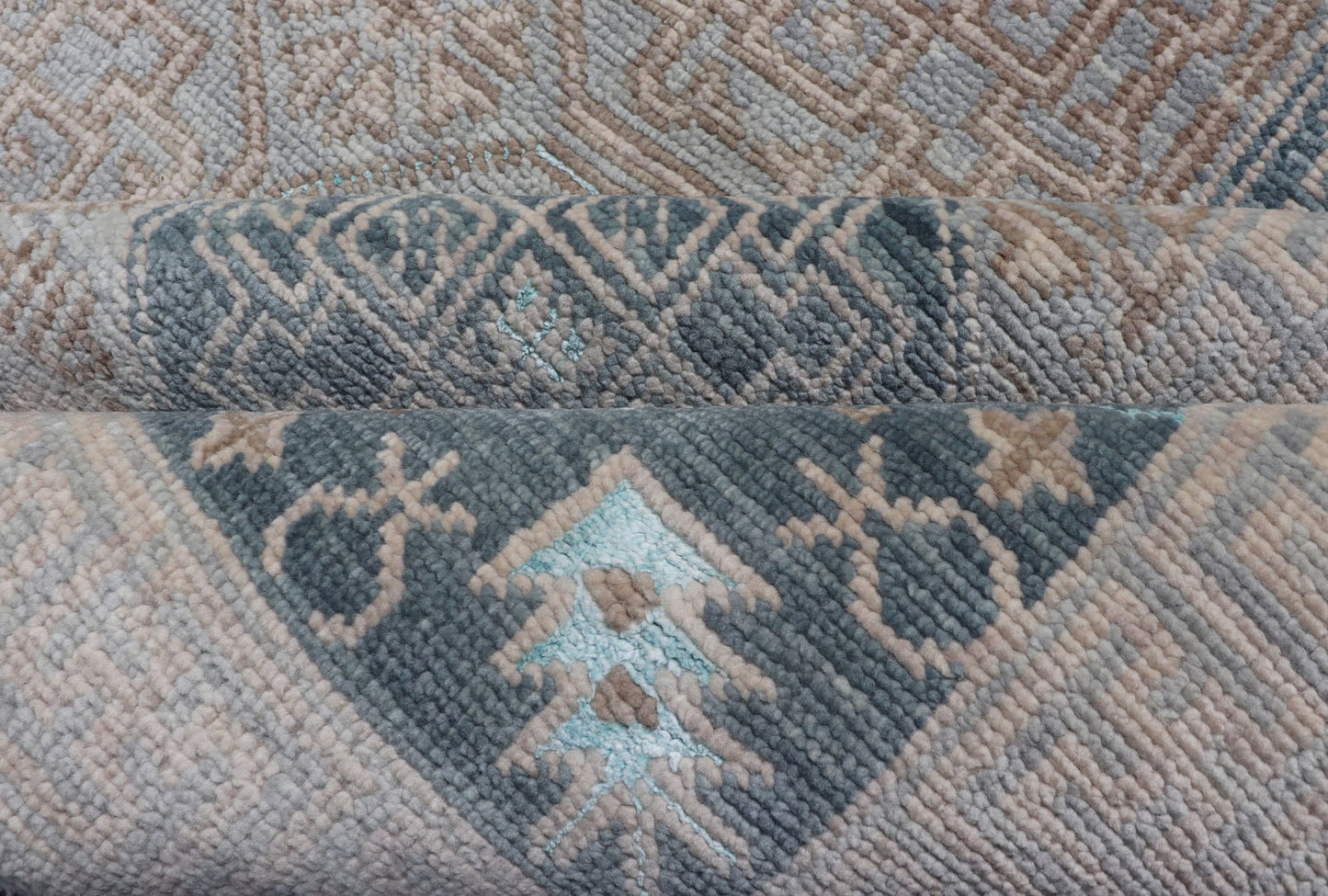 Modern Hand Knotted Khotan in Wool with All - Over Medallion Design in Blue and Earthy Tones This modern Indian Khotan rug has been hand - knotted in wool and features an all - over, sub - geometric medallion design rendered in blue and earthy tones. A ... - Keivan Woven ArtsOB - 9538562 - 98000069 - 15490Rug
