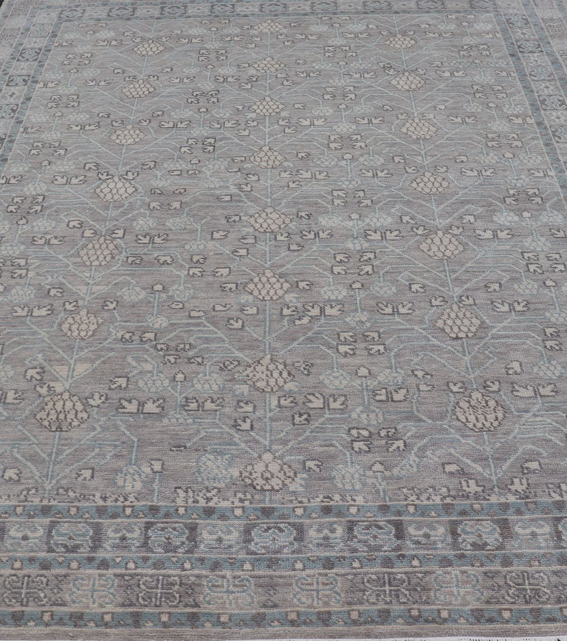 Modern Khotan Design Rug in Wool with All - Over Design By Keivan Woven Arts This modern Indian Khotan rug has been hand - knotted in wool and features an all - over, sub - geometric design rendered in muted tones. A complementary, multi - tiered border ... - Keivan Woven ArtsOB - 9543192 - 98000090 - 15496
