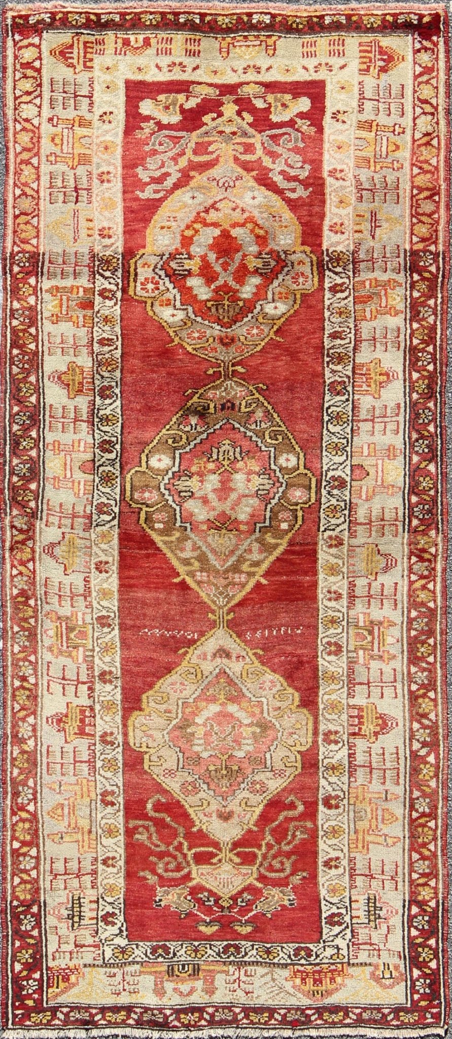 Antique Turkish Oushak Runner In Red Background with Neutral Medallions Measures: 3.11 x 9.0 This colorful Oushak carpet rests beautifully upon a field of elegant red. A large medallion of brown, taupe, yellow and gray takes center s... - Keivan Woven ArtsOSM - 02 - 4494Rug