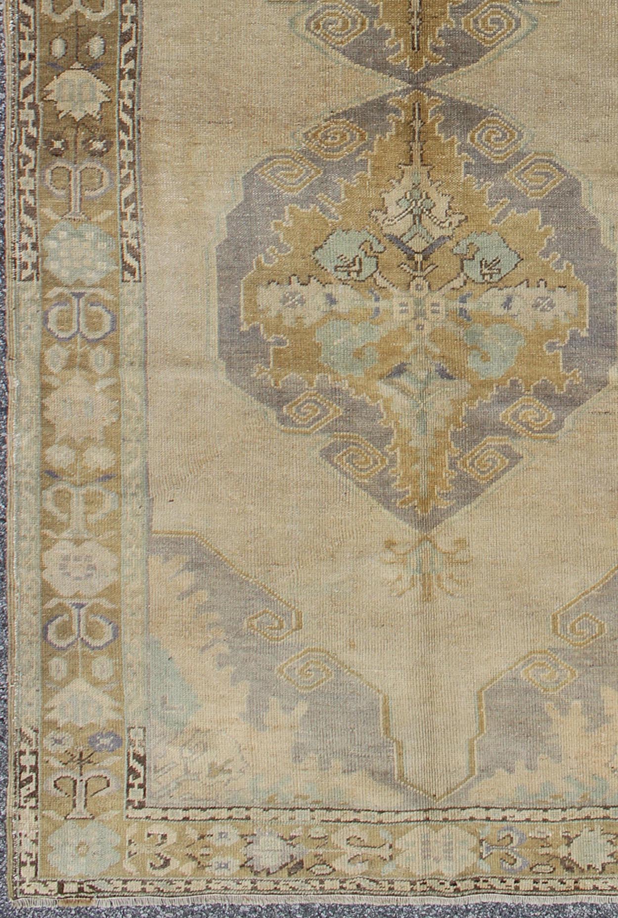 Vintage Gallery Turkish Oushak Rug With Floral Medallions in Earthy Tones and Lavender Keivan Woven Arts / rug OSM - 09, country of origin / type: Turkey / Oushak, circa 1940 Measures: 4'1 x 8'7. This vintage Oushak beautifully illustrates the impr... - Keivan Woven ArtsOSM - 09 - 4504Rug