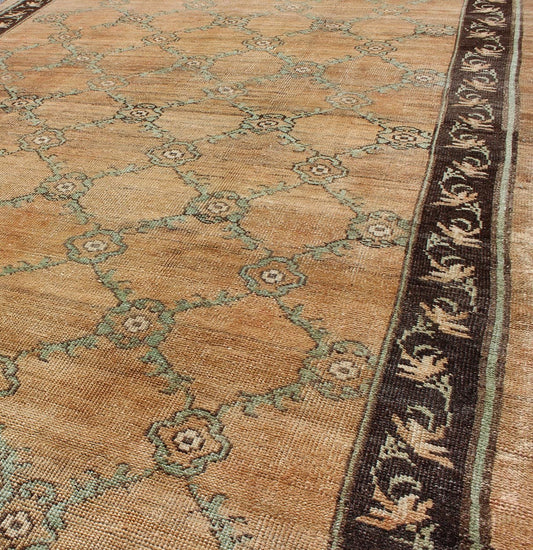 Gallery Turkish Oushak Rug This magnificent Oushak beautifully illustrates the impressive craftsmanship and design of Turkish weavers. The muted design of repeating flowers in light green on a orange background flows through the rug's center fie... - Keivan Woven ArtsOSM - 16 - 4510