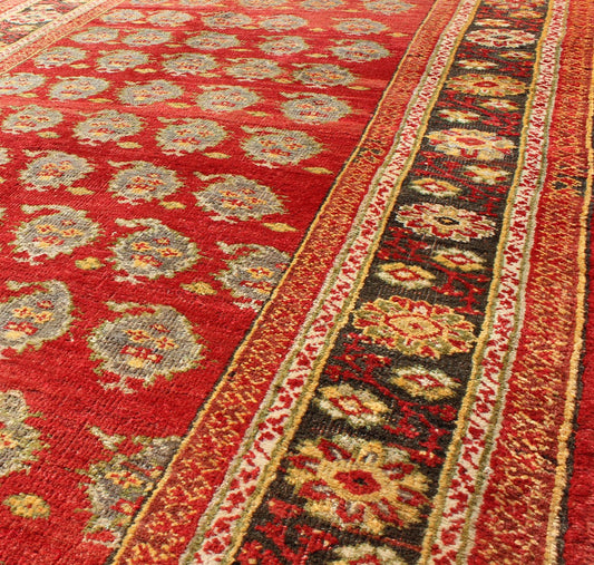 Red Turkish Oushak Carpet with All - Over Paisley Design and Central Red Field This unique Turkish Oushak carpet features an all - over design of intricate paisley shapes set atop a central field of bright red. The entire piece is encompassed by a f... - Keivan Woven ArtsOSM - 23 - 4518