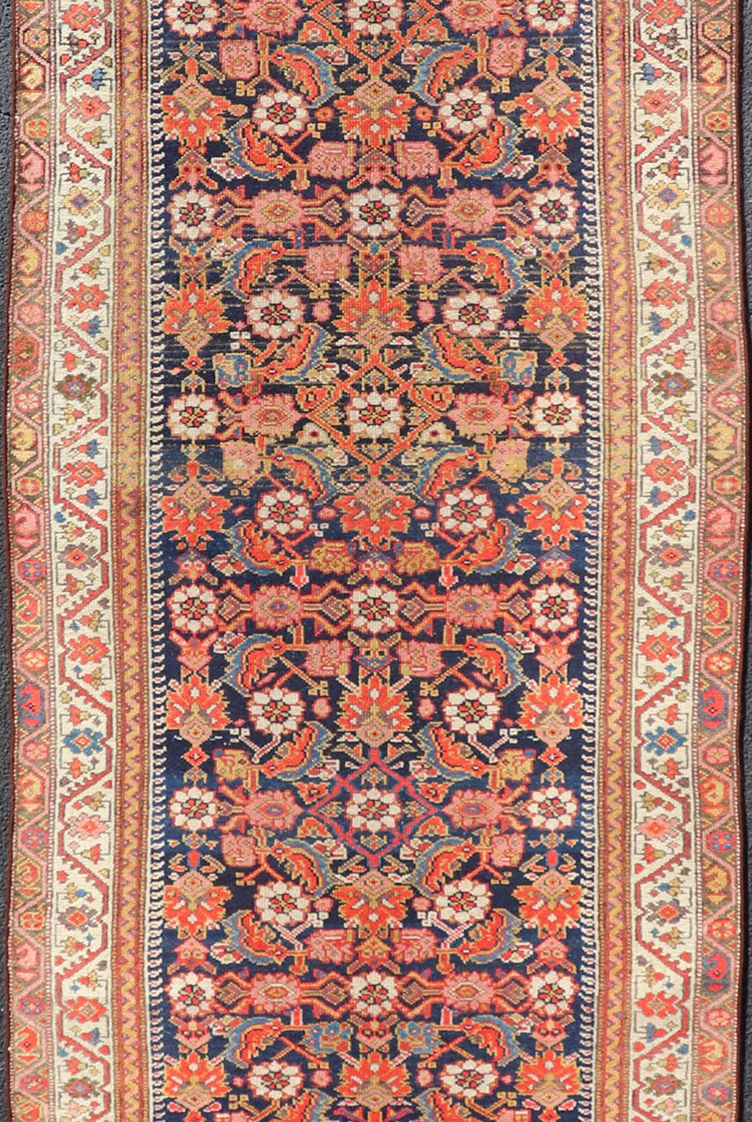 Colorful Antique Malayer Runner with All - Over Herati Design This stunning Antique Malayer features an all - over Herati Design set upon a dark blue background. The herati patterns are surrounded by a variety of splendid motifs, rendered in Ivory,... - Keivan Woven ArtsPTA - 21015 - 18048