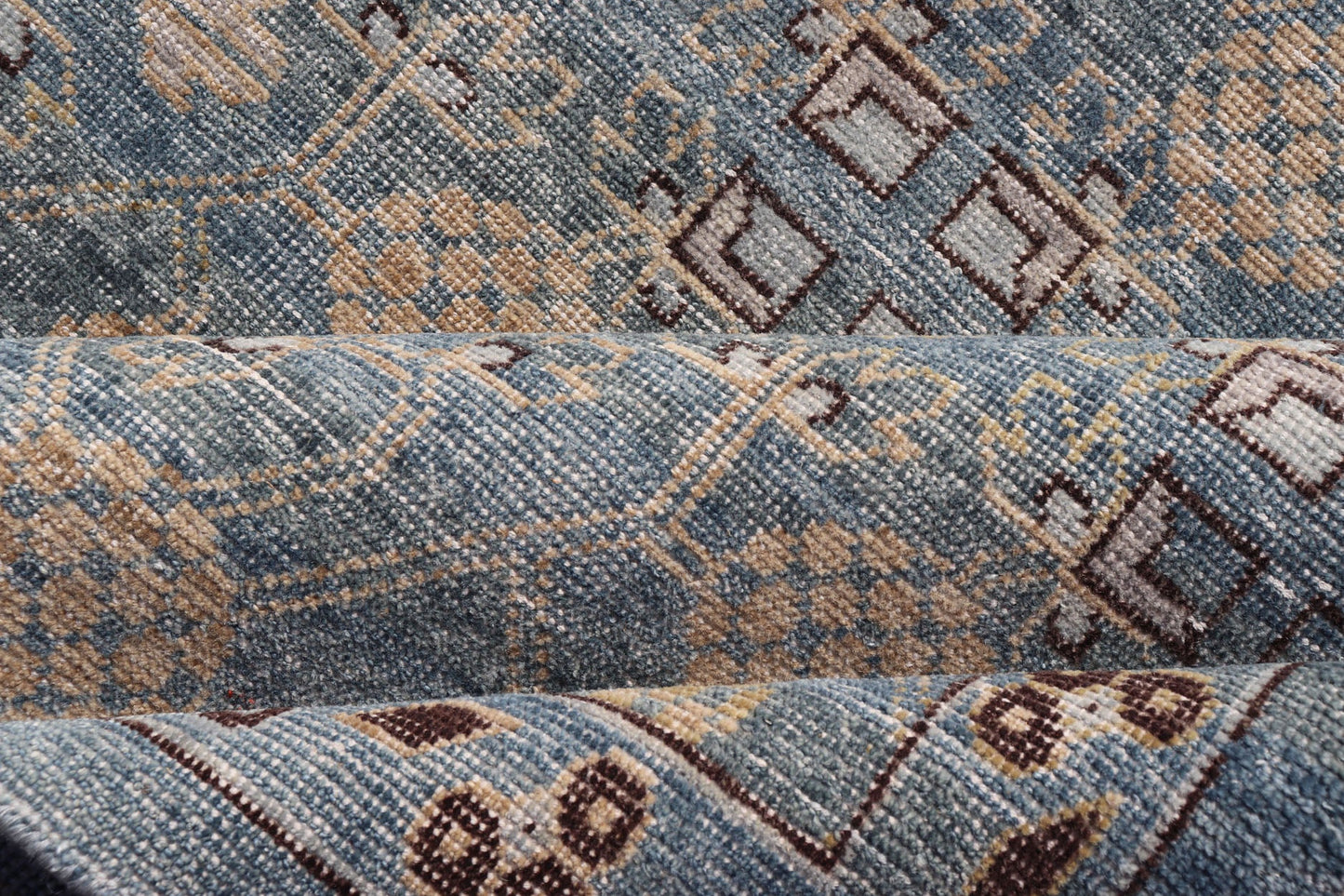 Modern All - Over Tribal Motif Khotan Area Rug in Dark Blues, Brown and Cream. Country of Origin: Afghanistan; Type: Khotan; Design: Floral, All - Over; Keivan Woven Arts: rug/PUR - 42561. Measures: 12'1 x 15'1 This modern Khotan features a modern da... - Keivan Woven ArtsPUR - 42561 - GS - 1016 - 22620Rug