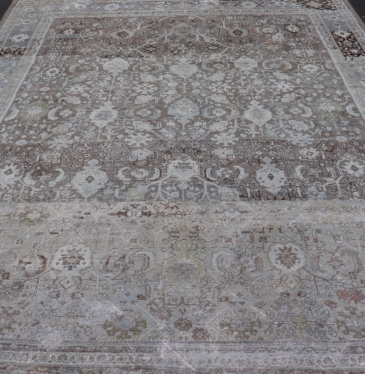 Ivory and Brown Antique Persian Mahal Rug with Floral Medallion Design Cream, brown, and green antique Persian Mahal rug with floral medallion design, rug R20 - 0707, country of origin / type: Iran / Mahal, circa 1920 This antique Persian ... - Keivan Woven ArtsR20 - 0707 - 12982Rug