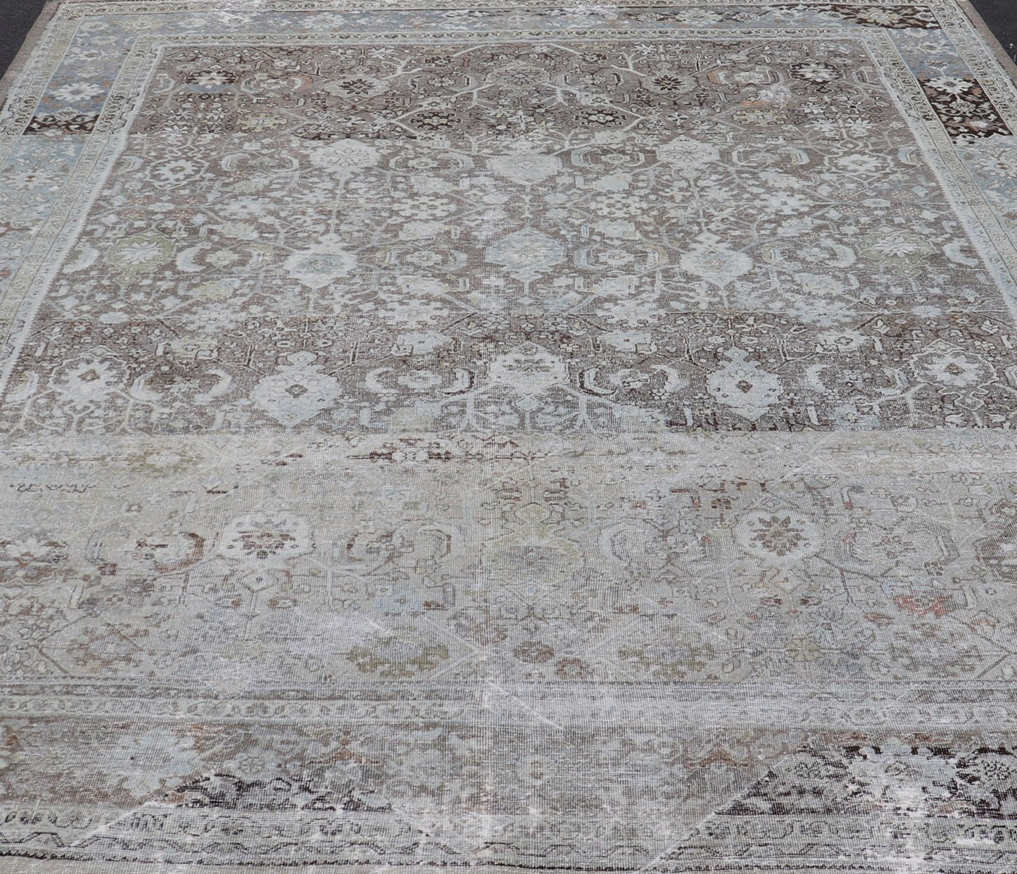 Ivory and Brown Antique Persian Mahal Rug with Floral Medallion Design Cream, brown, and green antique Persian Mahal rug with floral medallion design, rug R20 - 0707, country of origin / type: Iran / Mahal, circa 1920 This antique Persian ... - Keivan Woven ArtsR20 - 0707 - 12982Rug