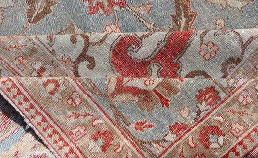 Measures: 11'2 x 17'2 Antique Persian Rug with Fine Weave Tabriz in Light Blue Background and Orange Finely woven antique Tabriz rug with circular, script - style medallion and blue field, Keivan Woven Arts / rug / R20 - 0804. Classic Persian r... - Keivan Woven ArtsR20 - 0804 - 13098Rug