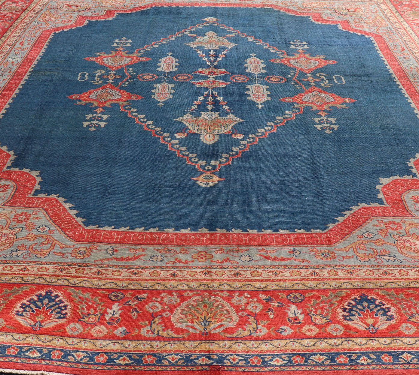 Large Antique Turkish Oushak Rug in Vibrant Blue and Red with Medallion Design Squared Shape Antique Turkish Oushak rug in vibrant blue, red, medallion geometric design, kwarugs Keivan Woven Arts / R20 - 0834. Colorful Oushak in vibrant colors. ... - Keivan Woven ArtsR20 - 0834 - 13374Rug