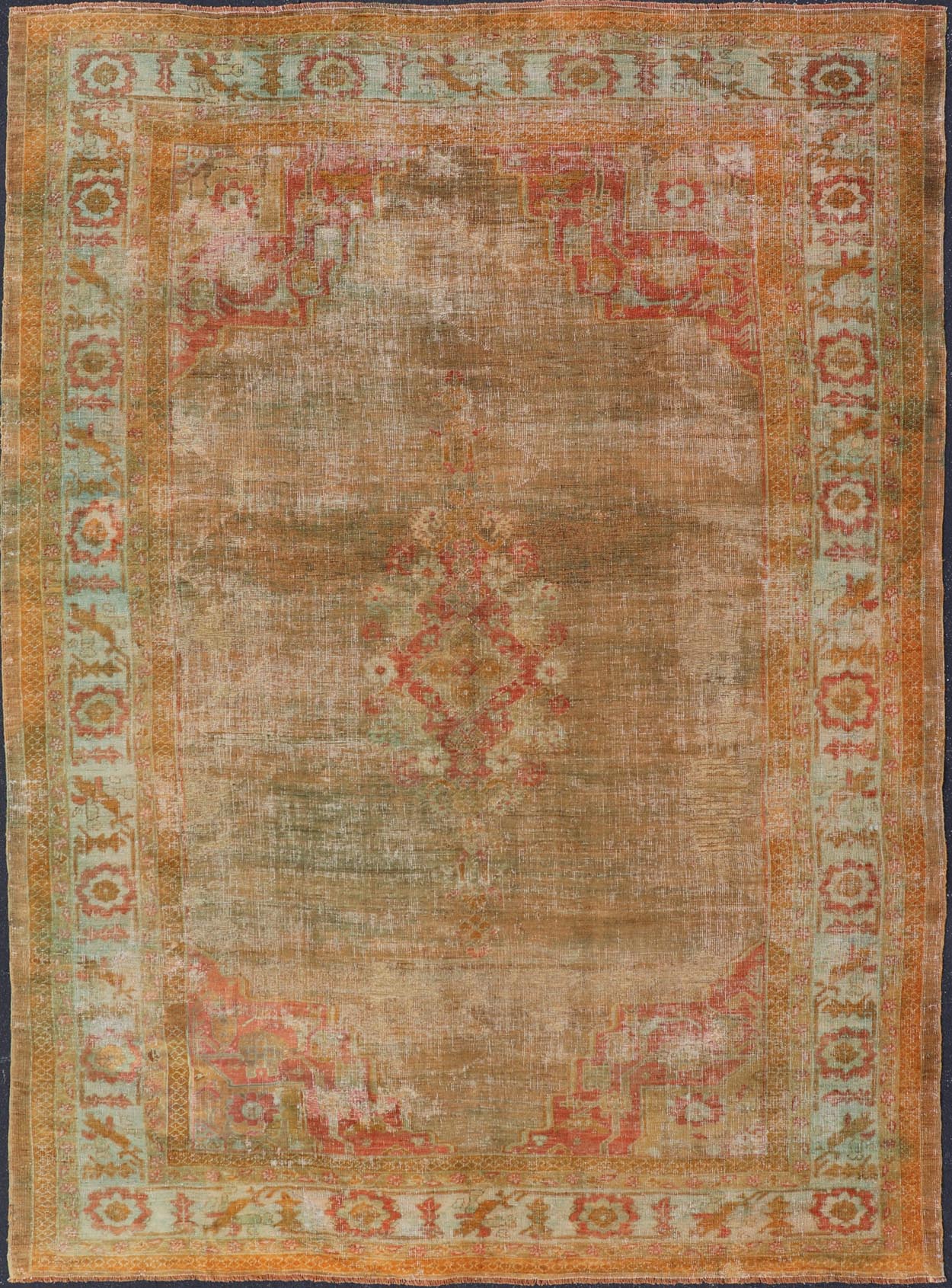 Antique Turkish Oushak Keivan Woven Arts With Medallion in Green, Coral, L. Blue & Marigold. Keivan Woven Arts / rug / R20 - 1015, country of origin / type: Turkey / Oushak, circa 1900 Measures: 8'10 x 12'4 This diverse and beautiful 1900'... - Keivan Woven ArtsR20 - 1015 - 14152Rug