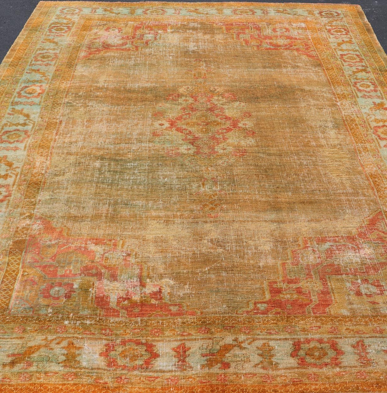 Antique Turkish Oushak Keivan Woven Arts With Medallion in Green, Coral, L. Blue & Marigold. Keivan Woven Arts / rug / R20 - 1015, country of origin / type: Turkey / Oushak, circa 1900 Measures: 8'10 x 12'4 This diverse and beautiful 1900'... - Keivan Woven ArtsR20 - 1015 - 14152Rug