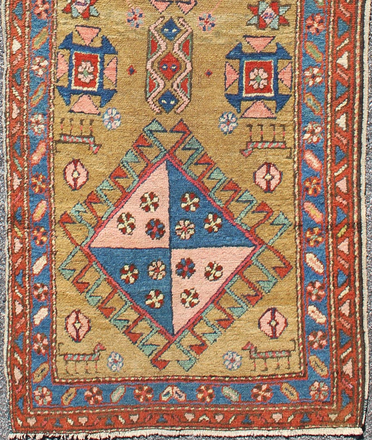 Antique Persian Serapi Runner with Gold Background This antique Serapi - Heriz displays a charming and rich combination of various jewel colors. The geometric diamond shapes are repeated in different forms and colors throughout the background, whi... - Keivan Woven ArtsS12 - 0704 - 3315Rug
