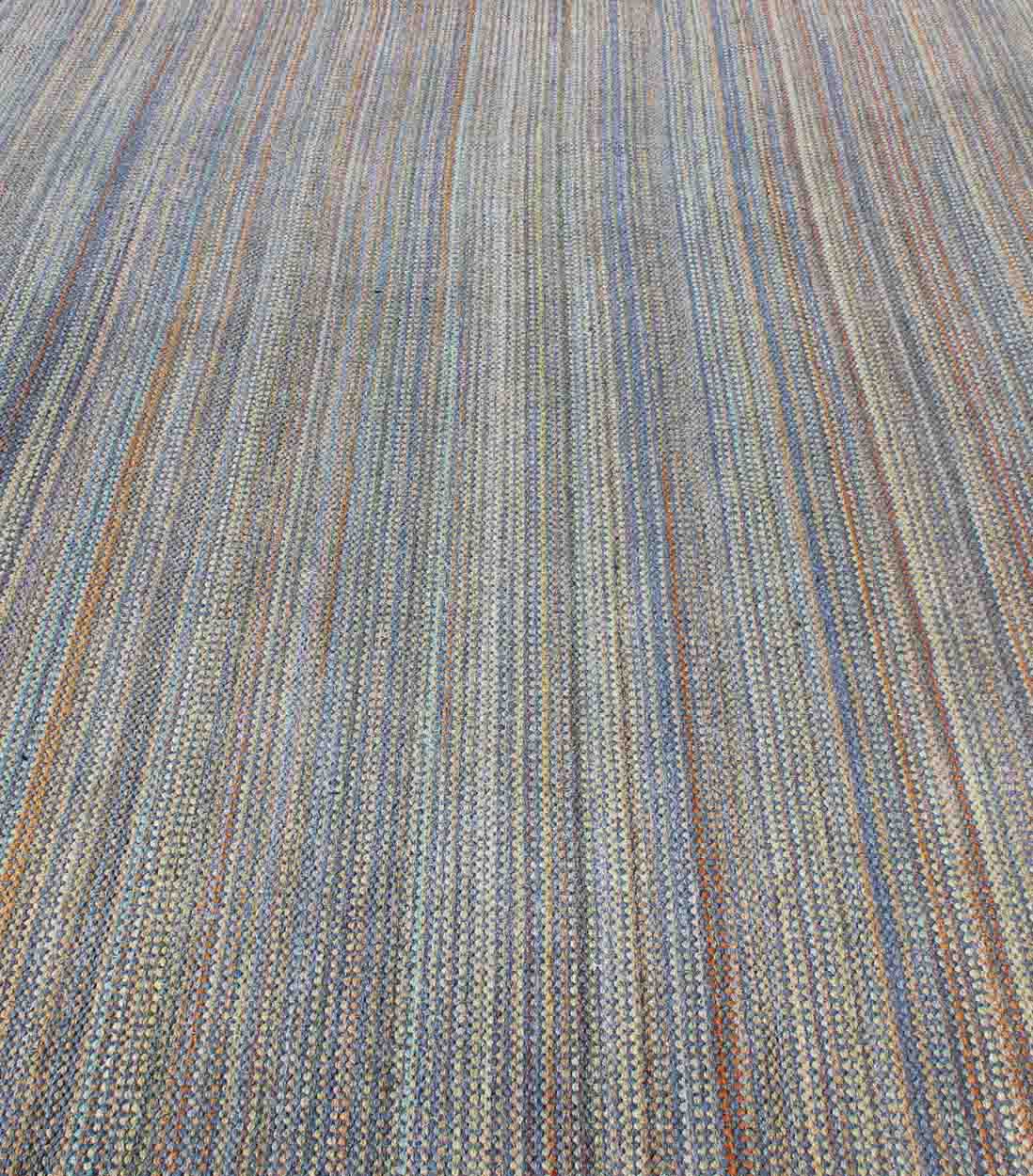 Large Vintage American Rug Braided in Multi - Colored. Measures: 8'5 x 11'2 This large American braided rug features a unique color palette coupled with a fine demonstration of American weaving. The tones of each stripe come together to p... - Keivan Woven ArtsS12 - 0708 - 3329Rug
