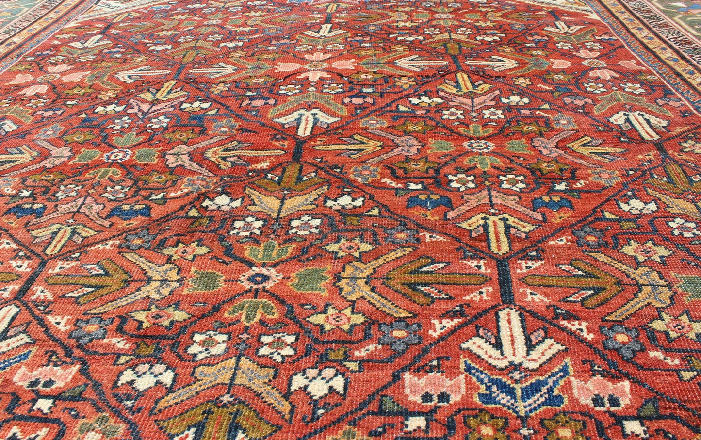 Antique Persian Sultanabad Rug The expansive terra - cotta red background of this piece consists of an intricate all - over design surrounded by a wide green border with ample motifs. Delicate vine - scrolls and sub - geometric elements emphasize the ae... - Keivan Woven ArtsS12 - 1212 - 4720Rug