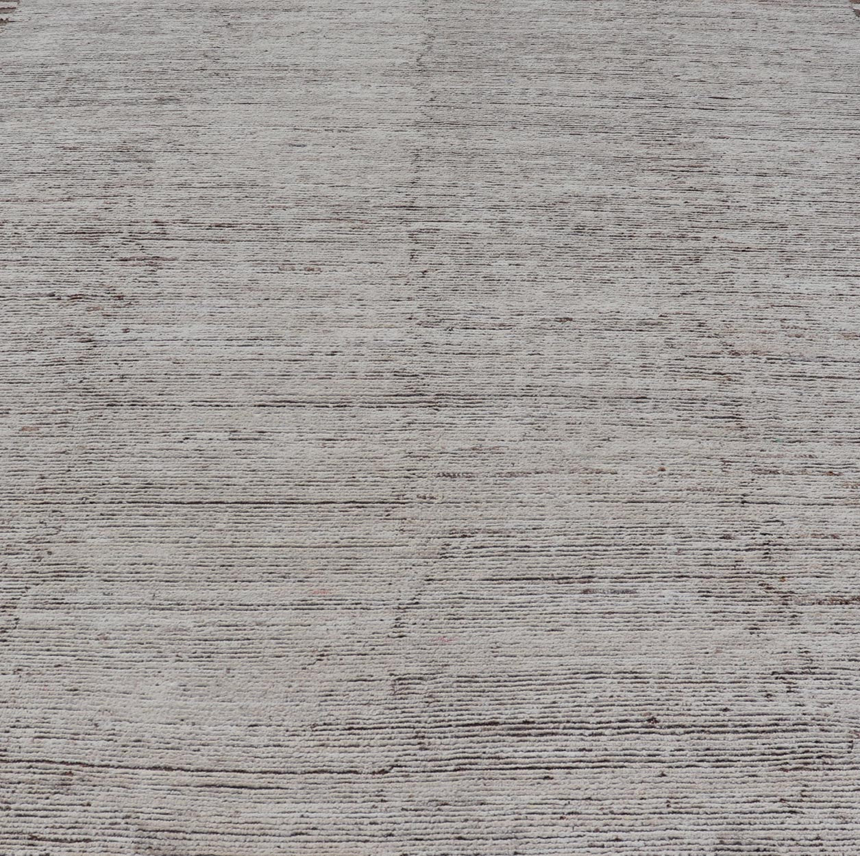 Minimalist Modern with Solid Off White Background in Textures Wool. As part of our modern casual collection, this distressed modern rug with Solid design is inspired by Moroccan rugs. The textured pile is white and off white wool and underneath the ... - Keivan Woven ArtsSNK - 1359 - 21505Rug