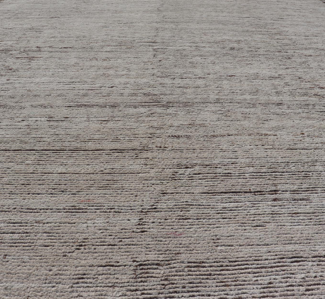 Minimalist Modern with Solid Off White Background in Textures Wool. As part of our modern casual collection, this distressed modern rug with Solid design is inspired by Moroccan rugs. The textured pile is white and off white wool and underneath the ... - Keivan Woven ArtsSNK - 1359 - 21505Rug