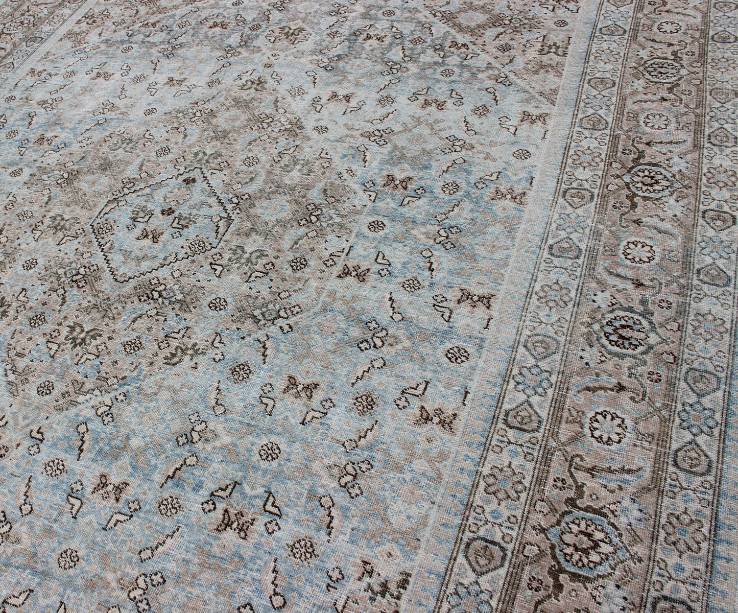 Stylized Persian Antique Tabriz Rug with Medallion Design and Muted Colors Persian Antique Tabriz Rug With Medallion With Herati Design and Muted Colors. Light Blue and Taupe Diamond Medallion Geometric Design Tabriz Rug from Persia. Keivan Wov... - Keivan Woven ArtsSUS - 1908 - 23 - 11629