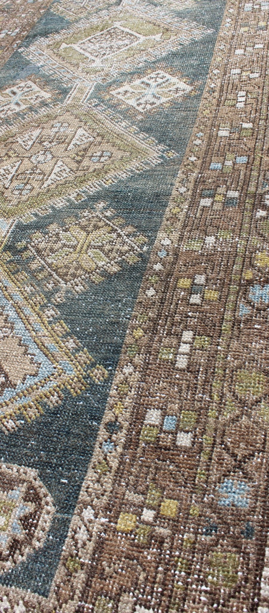Heriz Antique Persian Rug with Multi - Layered Geometric Medallions in Blue, Brown, rug sus - 4702, country of origin / type: Iran / Heriz Serapi, circa 1900 This magnificent Heriz Serapi runner woven in the early 20th century bears an exquisite des... - Keivan Woven ArtsSUS - 4702 - 9132Rug