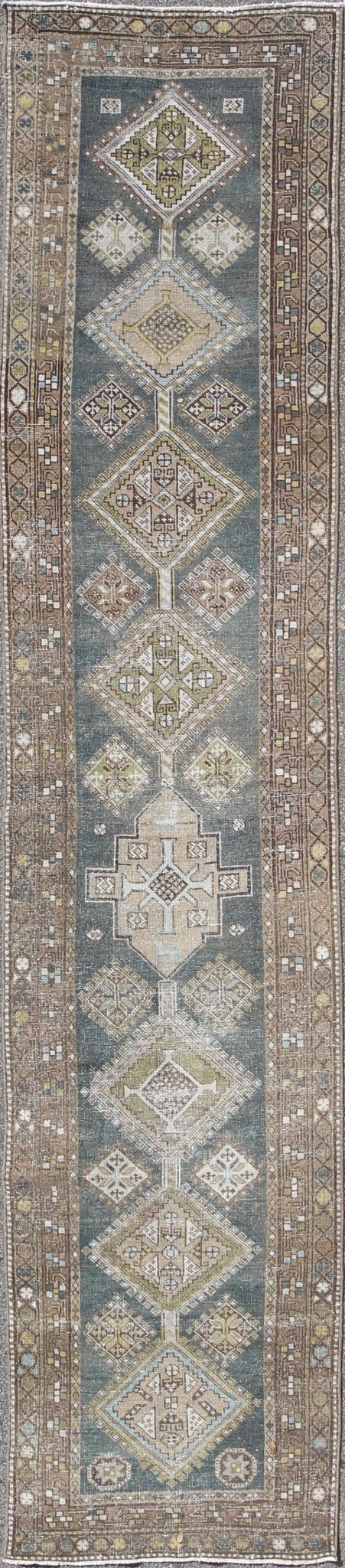Heriz Antique Persian Rug with Multi - Layered Geometric Medallions in Blue, Brown, rug sus - 4702, country of origin / type: Iran / Heriz Serapi, circa 1900 This magnificent Heriz Serapi runner woven in the early 20th century bears an exquisite des... - Keivan Woven ArtsSUS - 4702 - 9132Rug