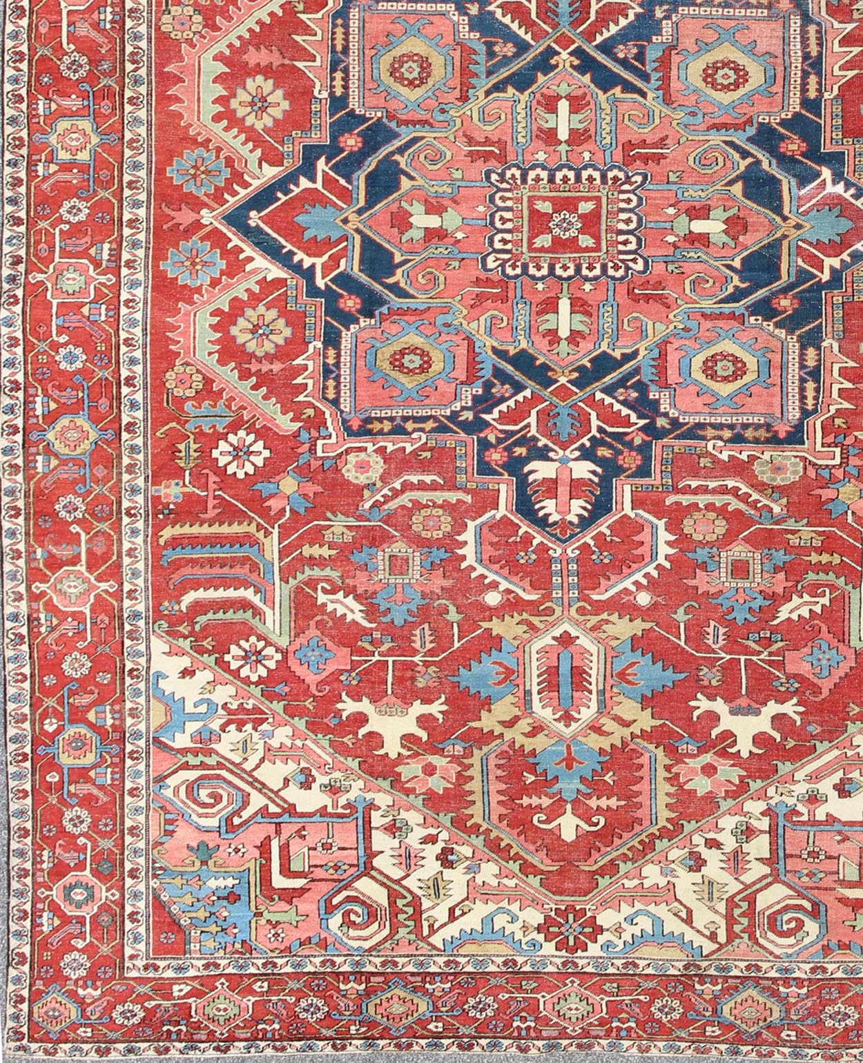 Antique Persian Serapi Carpet in Warm Red, Ivory, and Blue With Geometric Design. Keivan Woven Arts; rug TRA - 1010, country of origin / type: Iran / Serapi, circa 1900. Measures: 10'4 x 15'. This antique Persian Serapi carpet displays a wonderful... - Keivan Woven ArtsTRA - 1010 - 2567Rug
