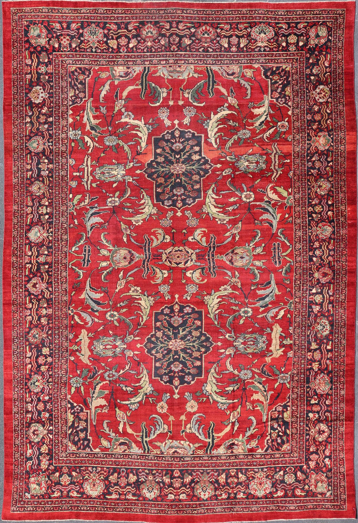 Antique Persian Ziegler Sultanabad Rug with Botanical Elements Set on Red Field. Keivan Woven Arts / rug TRA - 120701, country of origin / type: Iran / Ziegler Sultanabad, circa 1900. Antique Ziegler, Antique Sultanabad Measures: 12'3 x 18'3. Thi... - Keivan Woven ArtsTRA - 120701 - 3285Rug