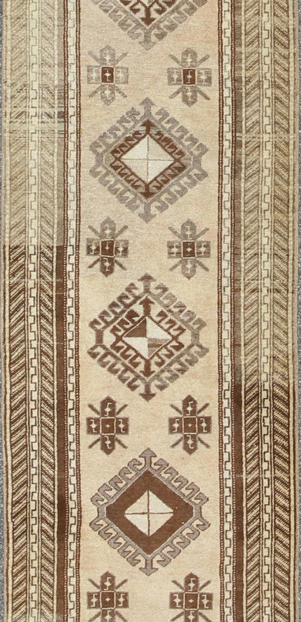 Earth - Toned Vintage Turkish Oushak Runner with Stacked Medallion Design. Light camel, brown, and taupe Oushak runner from Turkey with tribal geometric design, Keivan Woven Arts rug #TRA - 180401, country of origin / type: Turkey / Oushak, circa 1940. ... - Keivan Woven ArtsTRA - 180401 - 10217Rug