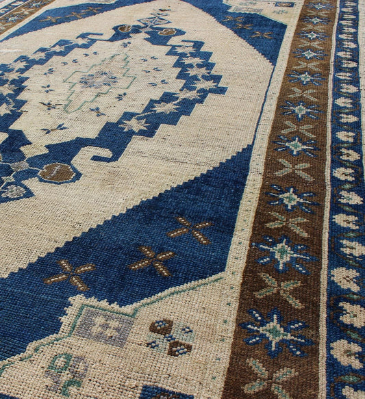 Keivan Woven Arts - Vintage Turkish Oushak Medallion Rug in Navy Blue, Ivory, Taupe and Brown, Tulu rugs, Moroccan Rugs, Vintage Tulu, Vintage Moroccan Measures: 4'4 x 7'6. This vintage Turkish Oushak carpet (circa mid - 20th century) feature... - Keivan Woven ArtsTU - 9305 - 1676