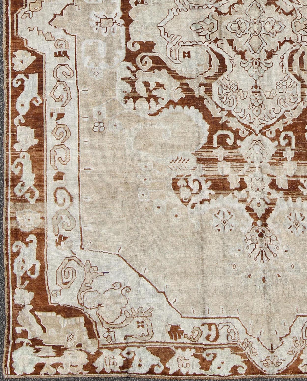 Vintage Turkish Kars Carpet with Floral Medallion in Sienna, Mocha and Bone This incredible vintage Kars carpet beautifully illustrates the imaginative artistry of eastern Turkish weavers. A large and bold sweeping floral medallion takes center ... - Keivan Woven ArtsTU - ARS - 474 - 2460Rug